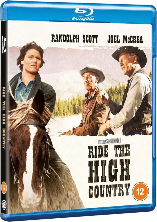 Randolph Scott en Joel McCrea op paarden in Ride the High Country, met in de verte heuvels en bomen.