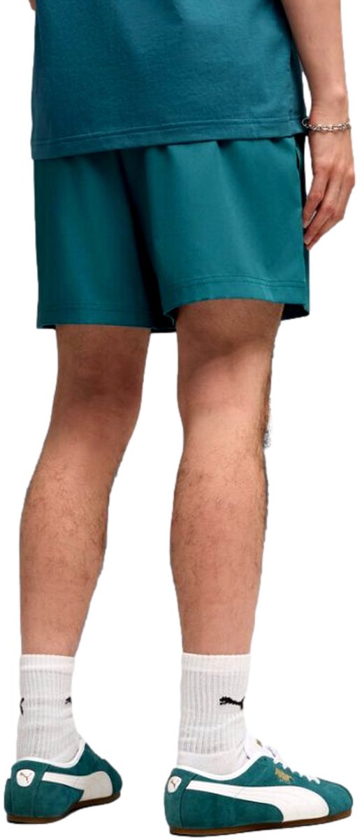 Puma essentials tape woven 5in short in de kleur . Groen