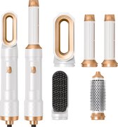 De witte en gouden stijltang met 5 verwisselbare opzetstukken: 2 mondstukken, 2 krulaccessoires, 1 haarstijltang en 1 ronde borstel.
