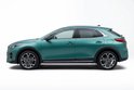 Groene Kia XCeed 2019-heden, profiel van links, witte achtergrond