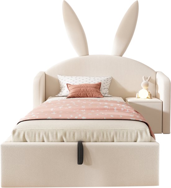 Beige kinderbed met konijnenoren, een nachtkastje met lampje en een opbergruimte onder het matras.