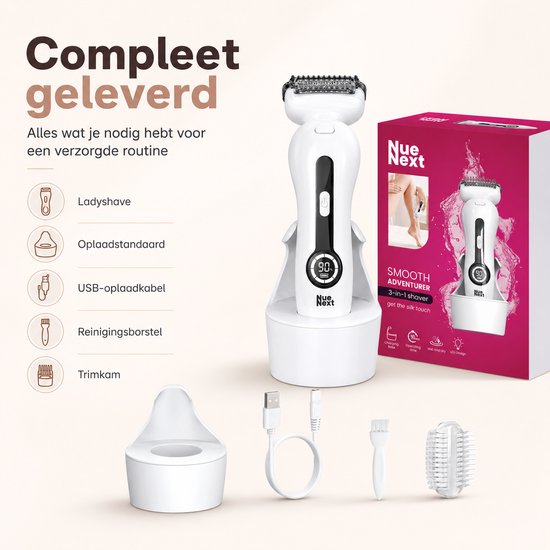 Witte ladyshave met alle accessoires: oplader, USB-kabel, borstel, trimkam, en de doos.
