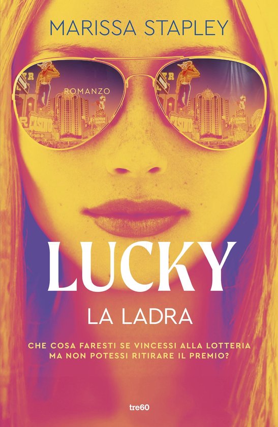 De cover van het boek 'Lucky. La ladra' door Marissa Stapley, met een close-up van een vrouw met grote zonnebril met reflecties van een casino.