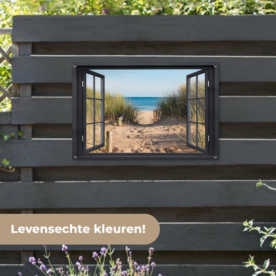 Decoratieve poster met een open raam dat uitkijkt op een zonnig strand met duinen en de zee, met tekst 'Levensechte kleuren!'.