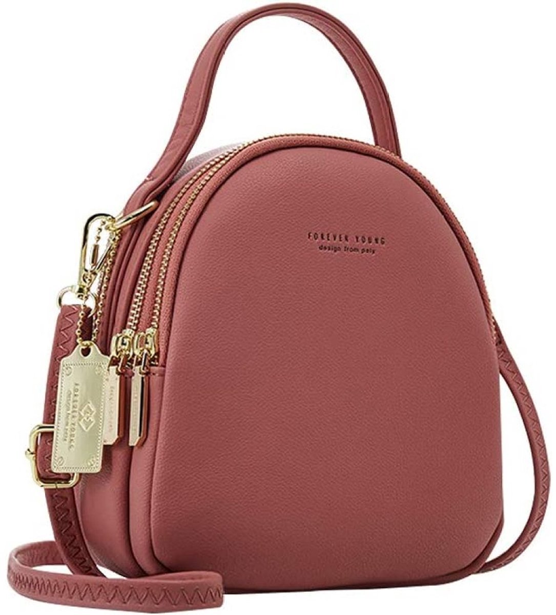 Multifunctionele damesrugzak – Omvormbaar tot crossbodytas, schoudertas of handtas – Mini-model in leerlook – Compact reisformaat – Zwart – 19 x 15,5 x 9 cm