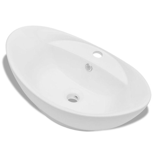 Lavabo ovale en céramique blanc avec trou de robinetterie et vidange.