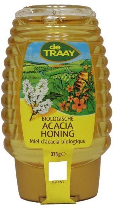 Gele fles honing met een geel label met een afbeelding van een bijenkorf op een veld. De tekst luidt 'Biologische Acacia Honing'.