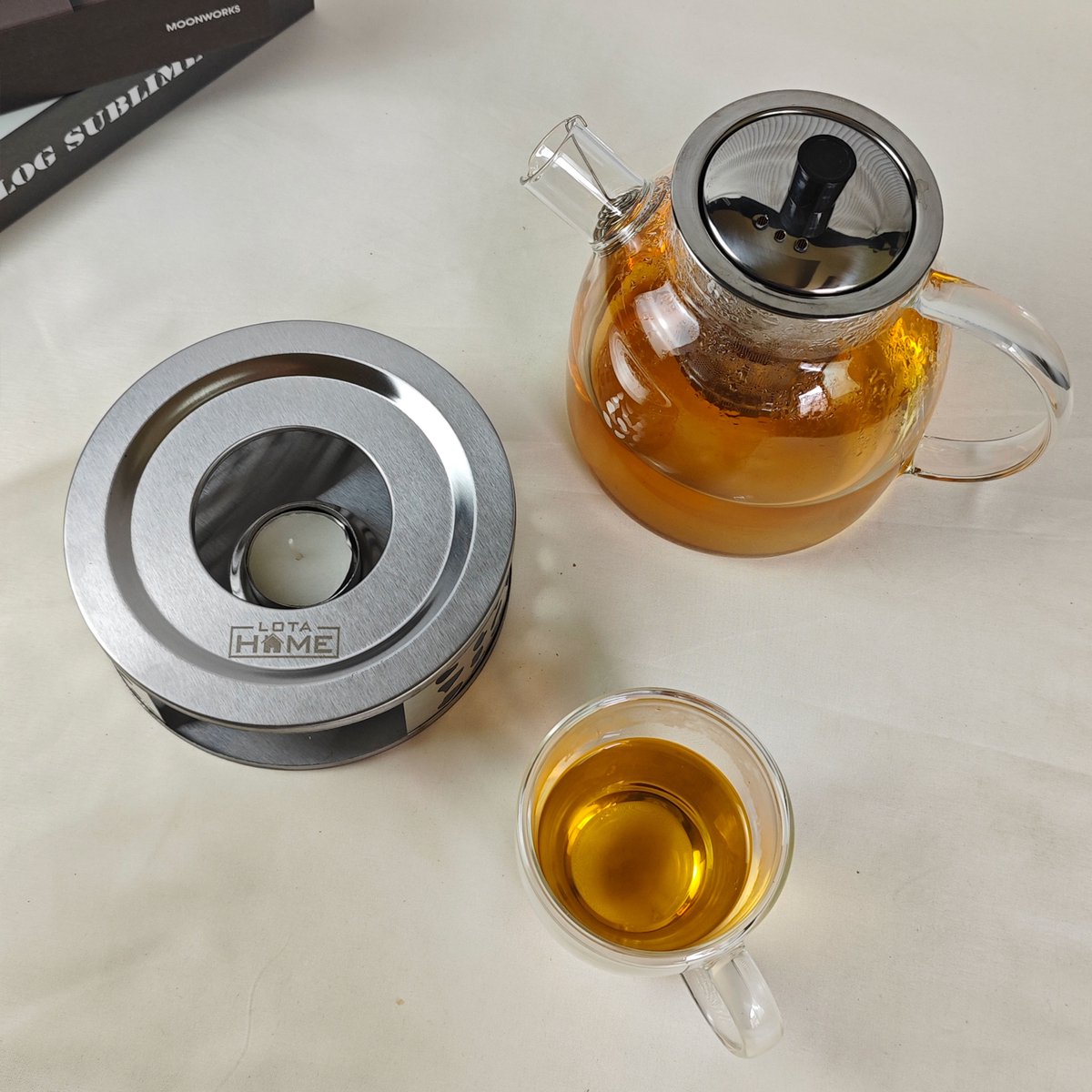 LotaHome - Glazen Theepot met Filter en Theelicht Warmhouder Set - Theepot met Verwarmingselement - Borosilicaat Glas - RVS Zeef - Glazen Theepot voor Losse Thee of Theebloemen - Theepot met Filter en Warmhouder - Met Schoonmaakspons - 1.5 liter — cadeau in Koken & Dineren - foto 6