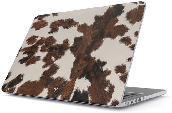 MacBook avec une coque à imprimé peau de vache.