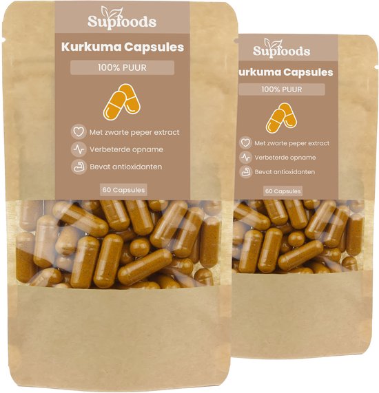Twee bruine zakken met transparant venster gevuld met gele kurkuma capsules, staand naast elkaar.