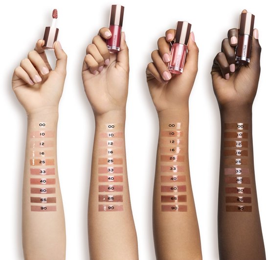 Vier verschillende armen met huidtinten tonen Lancôme lipgloss swatches. Kleuren variëren van nude tot bruin.