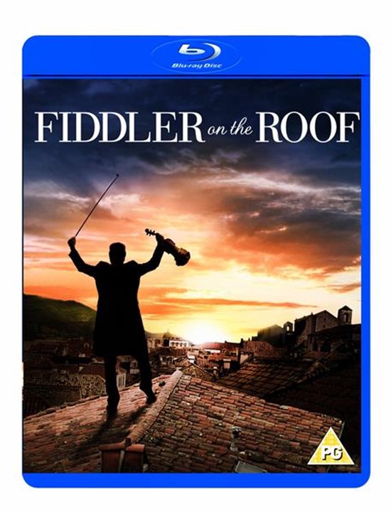 Fiddler on the Roof Blu-ray: Man op dak met viool en strijkstok bij zonsondergang.