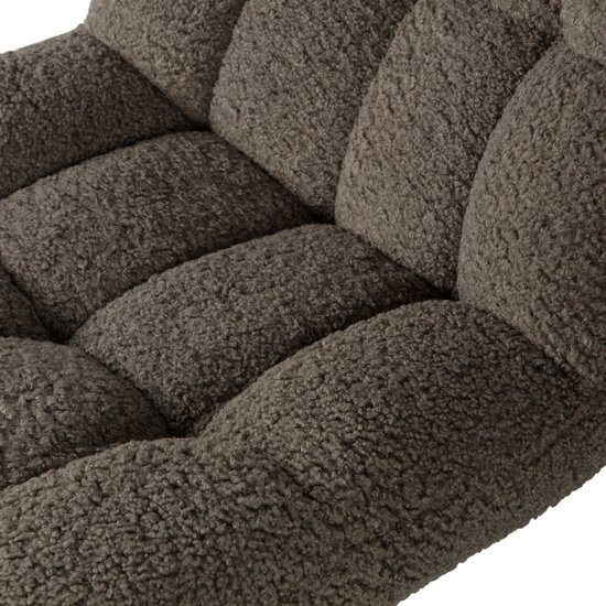 Close-up van de groene teddy stof met diepe vierkante quilting.