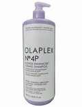 Lichtpaarse fles met pompdispenser, met daarop 'OLAPLEX N°.4P BLONDE ENHANCER TONING SHAMPOO'.