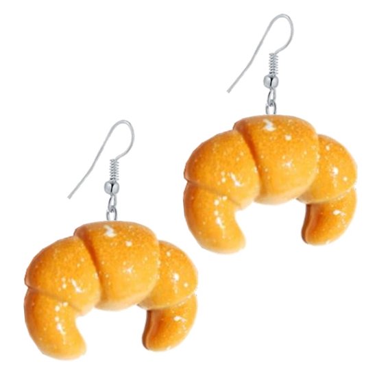Boucles d'oreilles croissants dorés avec pois blancs.