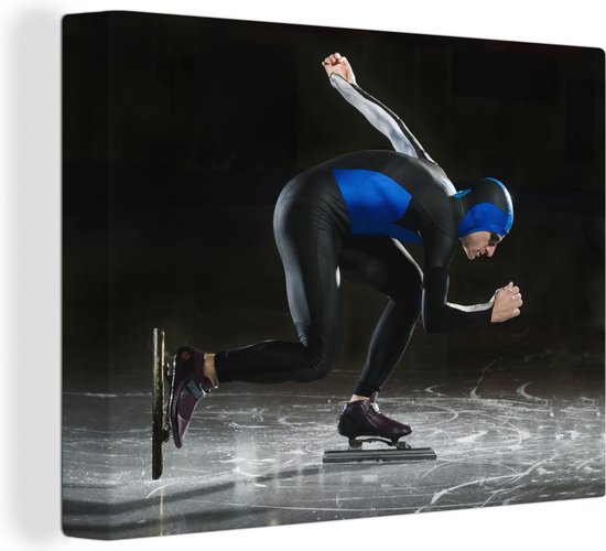 Canvas Schilderij Een mannelijke schaatser op het ijs - 120x90 cm - Wanddecoratie