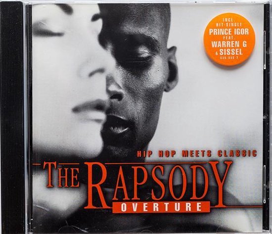 CD-hoes met de titel "The Rhapsody Overture", "Hip Hop Meets Classic", met close-up gezichten van een man en een vrouw.