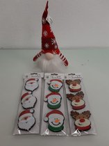Kerstman en een aantal kerstknijpers