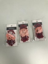 Haarbloemen sets - drie sets met elk drie bloemen - twee donkere en een lichte bloem per set