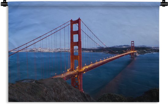 Wandkleed Golden Gate Bridge - Golden Gate Bridge verlicht in de avond Wandkleed katoen 150x100 cm - Wandtapijt met foto