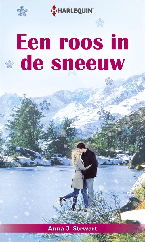 Een stel kust bij een bevroren meer met besneeuwde bergen en bomen.