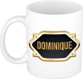 Dominique naam cadeau mok / beker met gouden embleem - kado verjaardag/ moeder/ pensioen/ geslaagd/ bedankt