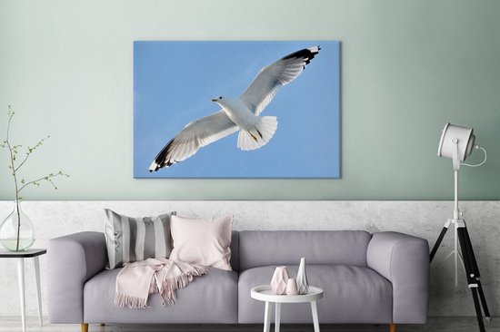 Gros plan d'une mouette en vol Toile 120x80 cm - Tirage photo sur toile (Décoration murale salon / chambre)