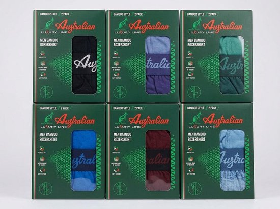 Zes groen verpakte dozen Australian Luxury Line met telkens 2 bamboe boxershorts in verschillende kleuren.