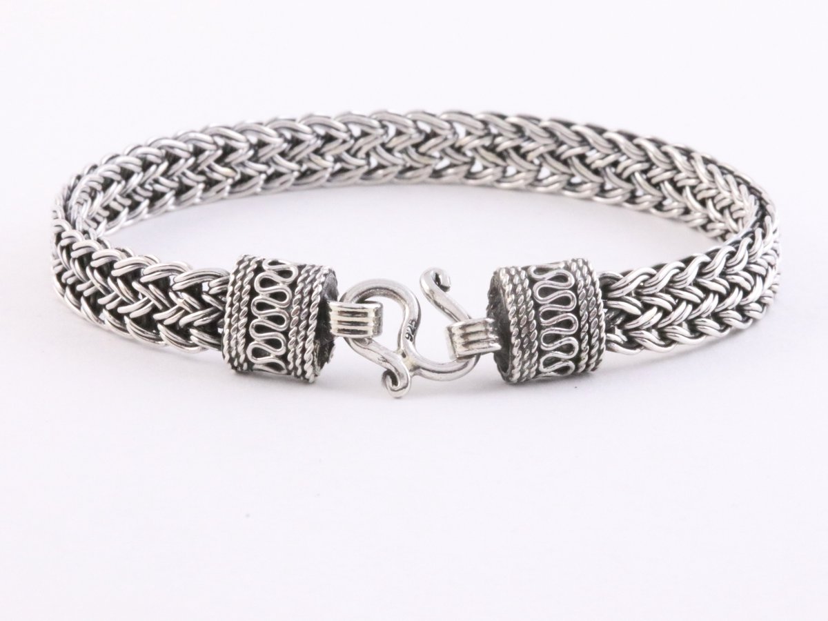 Gevlochten zilveren armband met bewerkte sluiting - lengte 20 cm