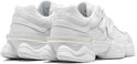 Achterkant van een paar off-white New Balance 9060 sneakers met transparante accenten op de zool.