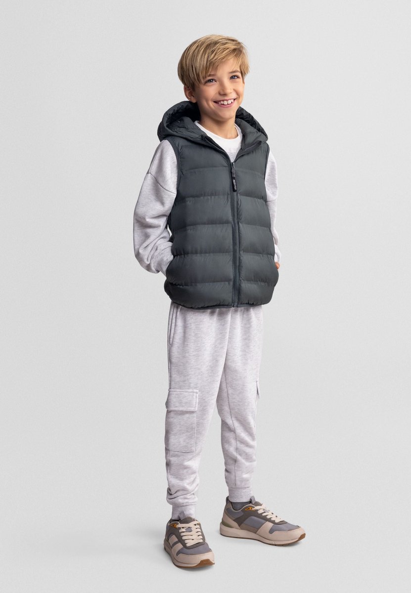 Minoti gewatteerde bodywarmer jongens met capuchon - gevoerd - groen
