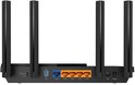 Achterkant van de router met vier antennes, USB-poort, blauwe WAN-poort en vier oranje LAN-poorten.