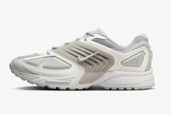 Nike Air Pegasus Wave sneaker in grijs en wit met kenmerkende gestreepte zijpaneel en Nike swoosh.