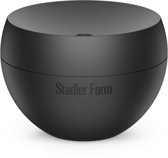 Zwarte, minimalistische Stadler Form aroma diffuser met een bolvormig ontwerp.