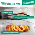 Contenant alimentaire transparent avec couvercle 'Snap & Seal' et joint étanche aux liquides et à l'air, rempli de pêches.