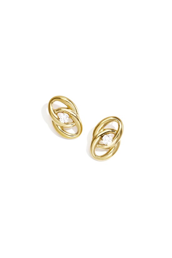 Gouden oorbellen met twee ovalen die elkaar kruisen en een strass steen in het midden.