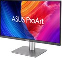 ASUS ProArt monitor in een hoek met zilveren standaard en kleurrijk scherm.