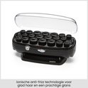 Zwarte BaByliss krulset met 20 zwarte rollers onder een transparante kap.