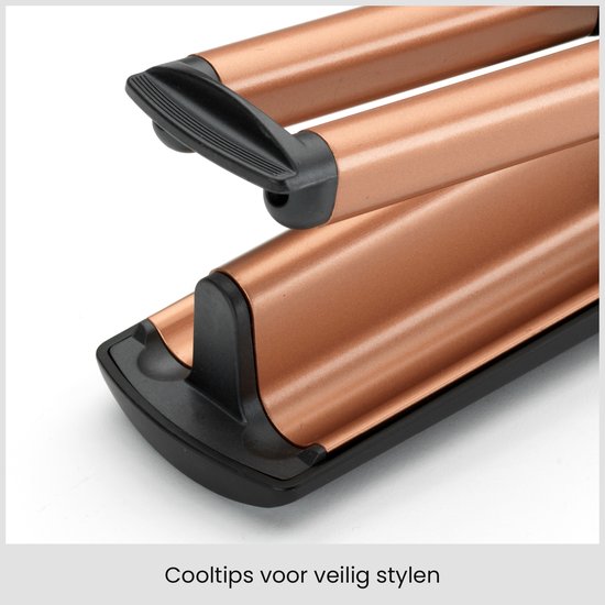 Detailopname van de zwarte stylingtool met koperkleurige toermalijn-keramische cilinders en koelte-uiteinden.