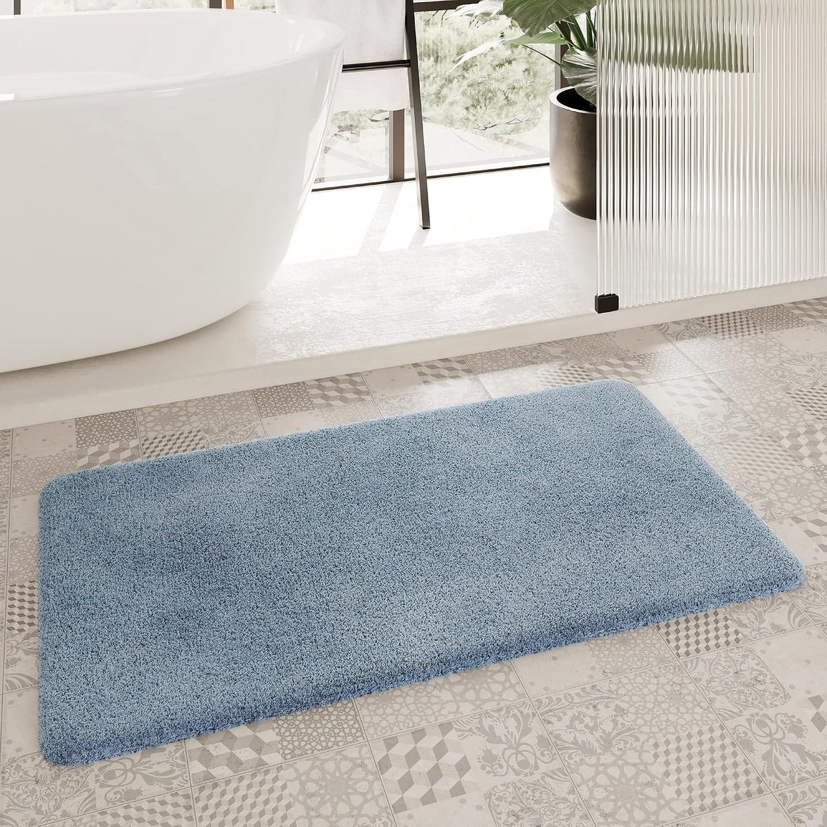 Living Porto Azzurro Badmat, behaaglijke pluizige zachte pool, antislip en wasbaar, 55 x 65 cm, rookblauw