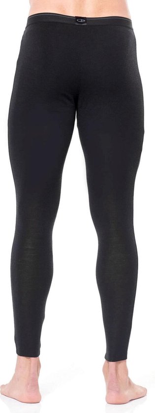 Achterkant van een man in een zwarte thermobroek.