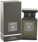 Tom Ford Oud Wood Eau de Parfum 100 ml fles naast een grijze, gestructureerde doos.
