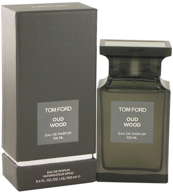 Tom Ford Oud Wood Eau de Parfum 100 ml fles naast een grijze, gestructureerde doos.