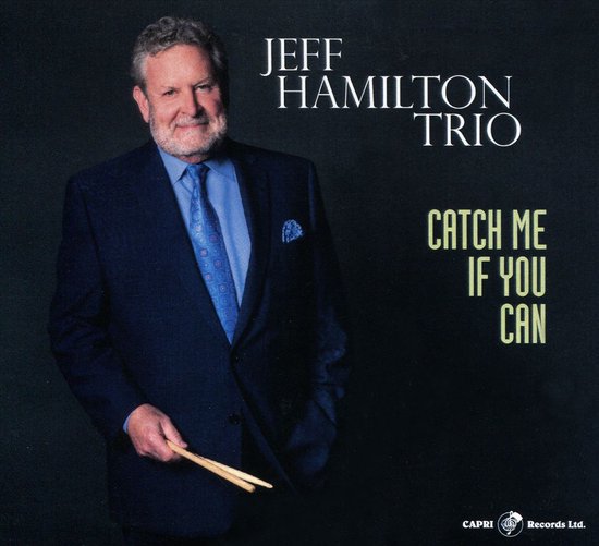 Jeff Hamilton Trio, CATCH ME IF YOU CAN albumcover met Jeff Hamilton in blauw pak en blauwe das, hij houdt drumstokken vast.