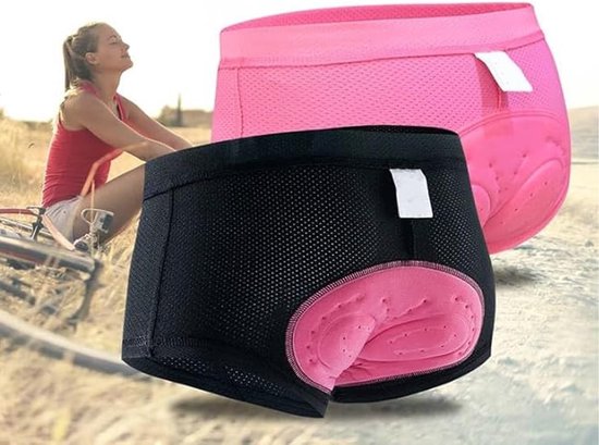 Culotte de cyclisme noire avec rembourrage 3D rose, présentée par une femme à vélo.