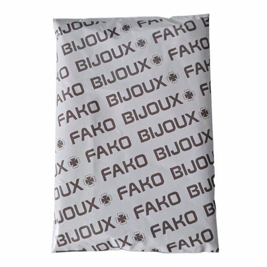 Verpakking met 'FAKO BIJOUX' logo en klavertjes vier.