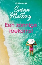 Een vrouw in een roze badpak en witte hoed staat in het turkooizen water aan de kust, met de golven om haar benen.