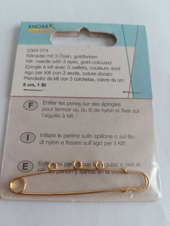 Kiltnaald met 3 goudkleurige ogen van Knorr Prandell.