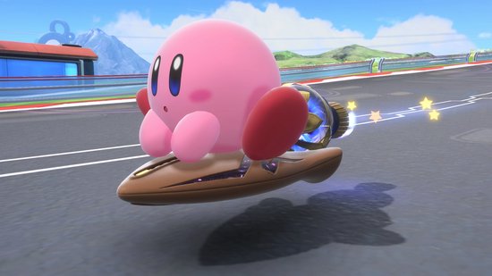 Kirby op een bruin hoverboard met straalmotor, vliegend op een racecircuit.