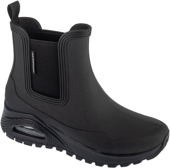 Botte Chelsea Skechers noire imperméable avec étiquette 'WATERPROOF' et amorti Air.